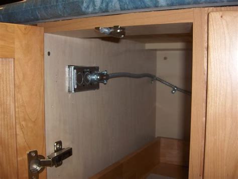 electrical outlet box for cabinet|electrical outlet inside cabinet.